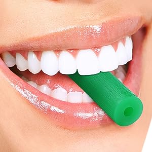 Woman smiling with a chewie in her mouth