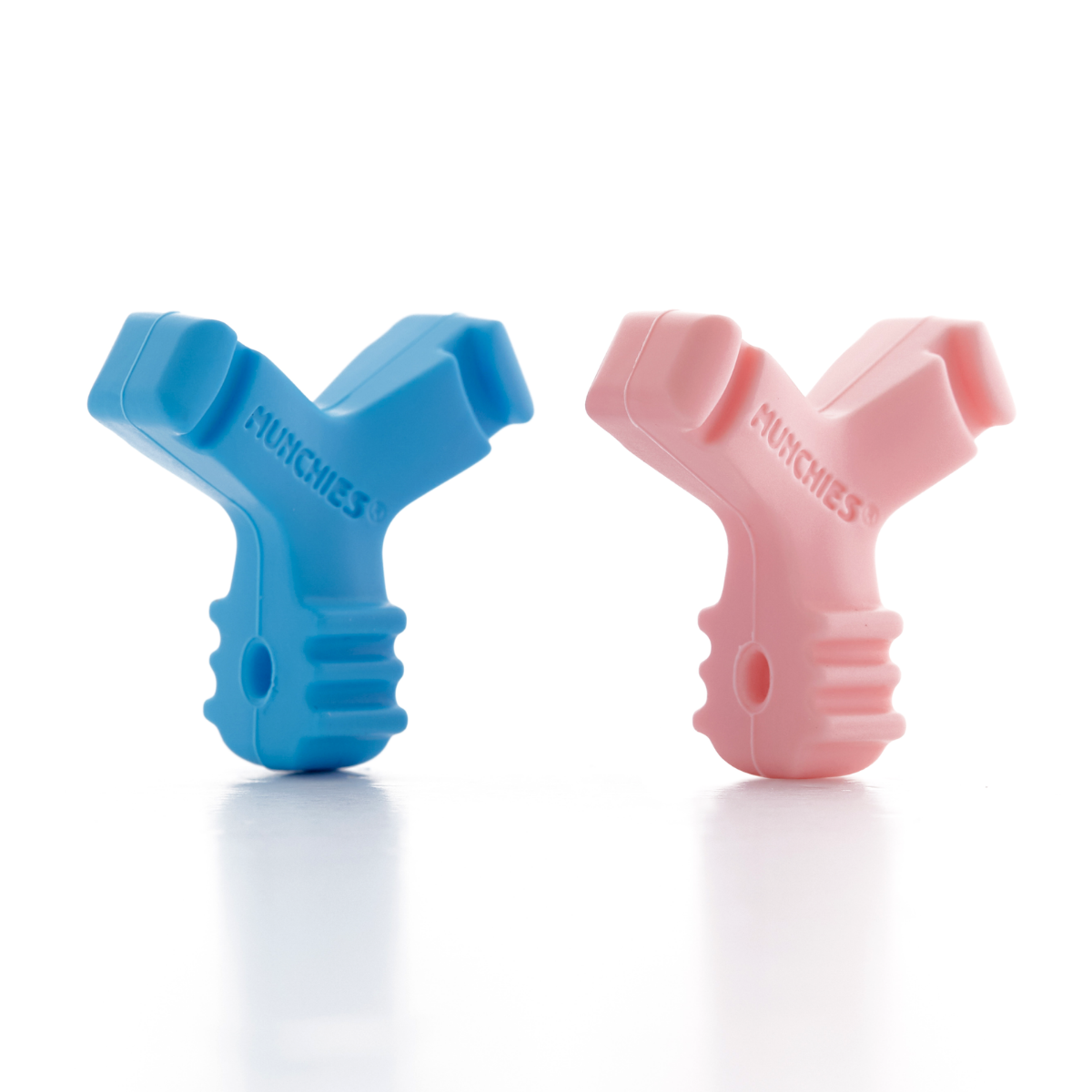 Blue and pink Munchies® EPS standing up next to each other